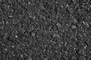 Dark Texture details of surface of asphalt or tamac on new road, background or wallpaper, meterial cpncept design photo