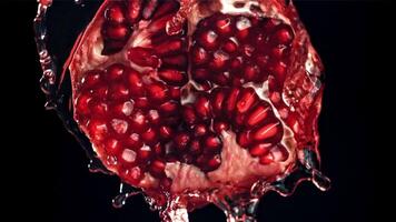 Fresh juice runs down the pomegranate. Filmed on a high-speed camera at 1000 fps. High quality FullHD footage video