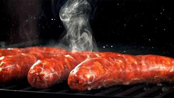 Sausages are fried with splashes in a pan. Filmed on a high-speed camera at 1000 fps. High quality FullHD footage video