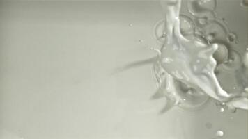 Fresh milk with splashes. Filmed on a high-speed camera at 1000 fps. High quality FullHD footage video