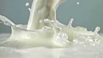 Fresh milk with splashes. Filmed on a high-speed camera at 1000 fps. High quality FullHD footage video