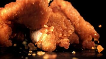 Chicken nuggets fall on the table. Filmed on a high-speed camera at 1000 fps. High quality FullHD footage video