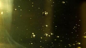 Bubbles of olive oil. Filmed on a high-speed camera at 1000 fps. High quality FullHD footage video