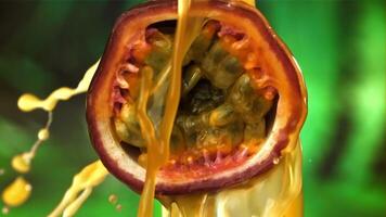 Fresh passion fruit with a splash of juice. Filmed on a high-speed camera at 1000 fps. High quality FullHD footage video