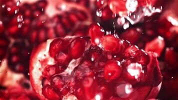 Pomegranate seeds fall on a piece. Filmed on a high-speed camera at 1000 fps. High quality FullHD footage video