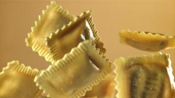 Ravioli fly up and fall down. Filmed on a high-speed camera at 1000 fps. High quality FullHD footage video
