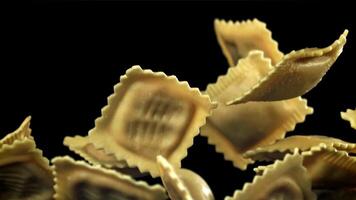 Ravioli fly up and fall down. Filmed on a high-speed camera at 1000 fps. High quality FullHD footage video