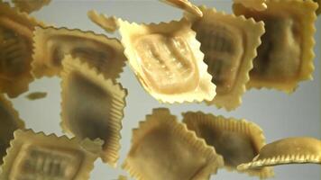 Ravioli fly up and fall down. Filmed on a high-speed camera at 1000 fps. High quality FullHD footage video