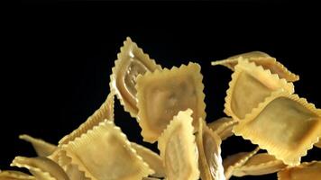 Ravioli fly up and fall down. Filmed on a high-speed camera at 1000 fps. High quality FullHD footage video