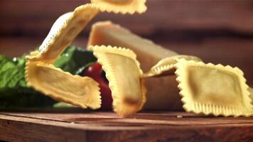 Italian ravioli falls on the table. Filmed on a high-speed camera at 1000 fps. High quality FullHD footage video