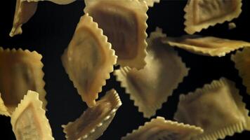 Ravioli fly up and fall down. Filmed on a high-speed camera at 1000 fps. High quality FullHD footage video