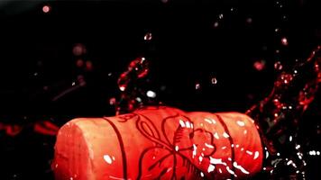 The cork from the bottle falls into the red wine with splashes. Filmed on a high-speed camera at 1000 fps. High quality FullHD footage video