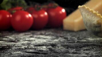 Italian ravioli falls on the table. Filmed on a high-speed camera at 1000 fps. High quality FullHD footage video