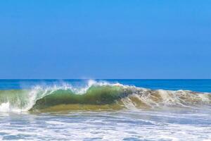 Extremely huge big surfer waves at beach Puerto Escondido Mexico. photo
