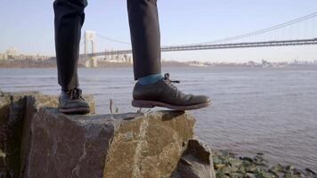 Male Person Walking Over Stone Rocks Overcoming Obstacles and Succeed video