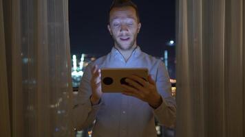 Young Handsome Man Using Tablet Screen on Business Travel video