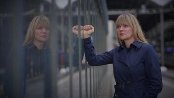 Sad Blond Woman Worried Thinking About Life Problems at Trainstation video