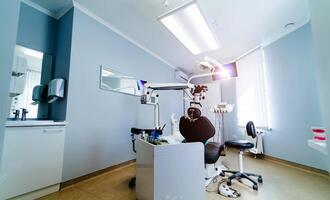 Brand new medical office. Dentist room. Stomatologist professional equipment. Hi tech medical clinic. Dentist clinic. Modern dental office interior. photo