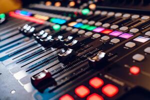 Studio mixing panel.Sound Mixer, Audio Mixer Slide. Music equipment blurred background. photo