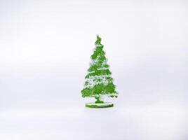 Christmas tree of wood isolated on white background. Home decoration for Christmas and New Year. photo