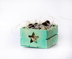 Home decoration in wooden crate on white background photo