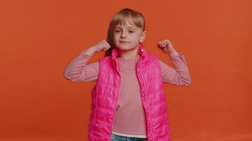 Girl showing biceps and looking confident, feeling power strength to fight for rights, success win video