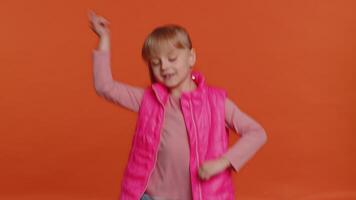 Overjoyed happy girl showing rock n roll gesture by hands, cool sign, shouting yeah with crazy face video