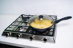 Cooking fried potatoes. Frying potatoes on the frying pan photo