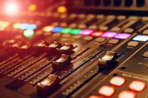 professional concert mixing console is equipped with high-precision and long-stroke faders. Close-up photo