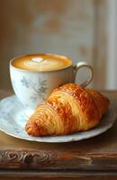 AI Generated Cup of coffee and croissant on wooden table photo