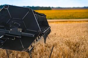 close view of modern combine harvester in action photo