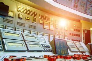 Industrial control panel at the energy plant. Energy and power generation. Selective focus closeup. Main safety board at power station. photo