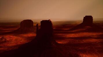 A picture of a desert with a few rocks in the foreground video