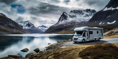AI generated Camping car against the backdrop of snowy mountains and a blue lake. Lifestyle concept for travelers photo
