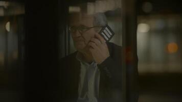 Upset Elderly Business Man in Suit Unappy Calling In Urban Town video