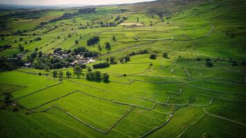 Aerial view of the small village and farm land in Yorkshire photo