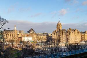 Scenic view of historic Edinburgh cityscape with clear blue sky photo