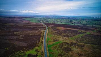 Aerial view of the hills and countryside road in Yorkshire photo