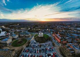 Aerial view of a cityscape at sunset with vibrant skies and parking lot in the foreground in York, North Yorkshire photo