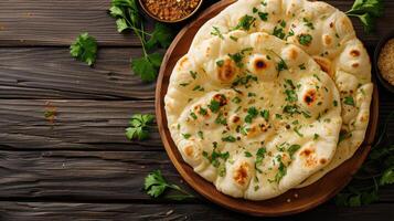 AI generated Indian naan bread on a plate, flatbread adorned with parsley and spices, Ai Generated. photo