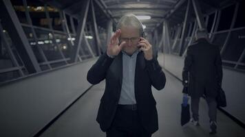 Upset Elderly Business Man in Suit Unappy Calling In Urban Town video