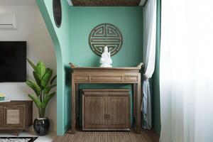 White Buddhist sculptured on the wooden pagoda, Wooden wall carving on the wall next to the window. photo