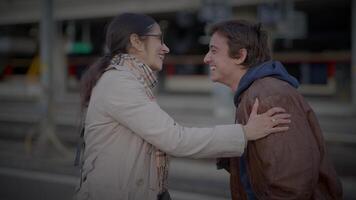 Reunion of Single Mother and Teenage Son Hugging at Railway Platform video