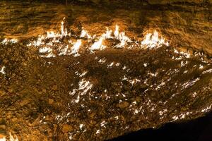 Darvaza Gas Crater, Derweze, Turkmenistan during the night. photo