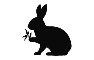 Easter Bunny Eating silhouette vector isolated on a white background