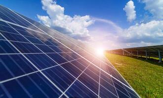 Solar panel produces green, environmentally friendly energy from the sun. photo
