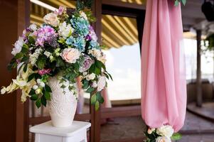 Beautiful wedding decorations for the ceremony outside in sunny weather photo