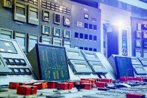 The central control room at energy power plant. Fragment of control panel. Selective focus. Closeup photo