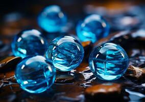 AI generated Large blue glass beads sitting on a dark background. Crystal balls on dark background photo