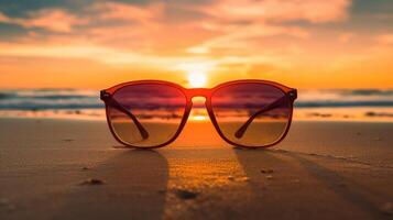 AI generated Orange sunglasses rest on sandy shores, framing a vibrant sunset over the tranquil ocean, Ai Generated photo